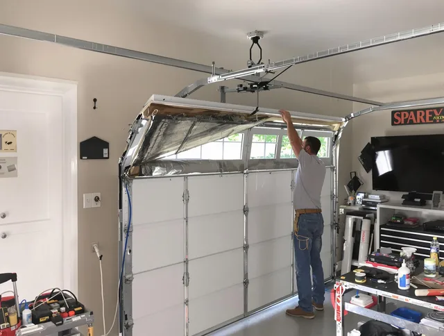 Garage door section replacement by Willowick Garage Door Repair in Willowick