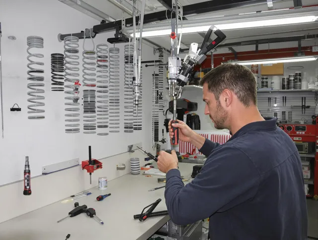 Willowick Garage Door Repair safety certified technician performing precision spring replacement in Willowick