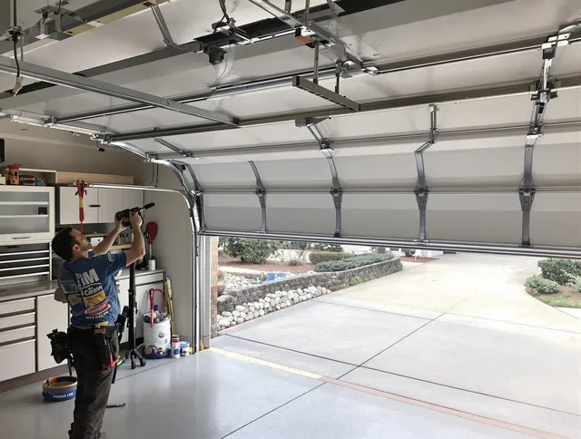 Garage door track repair service by Willowick Garage Door Repair in Willowick